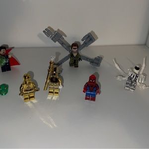 Legos lot includes Spider-Man,green goblin,Star Wars figure and more